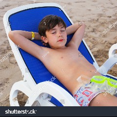 Boy At The Beach