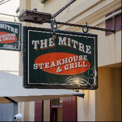 COMING MITRE