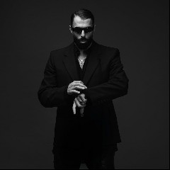 Afshin Momad,i Luciano